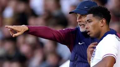 Thomas Tuchel speaks with Jude Bellingham during England's defeat to Senegal