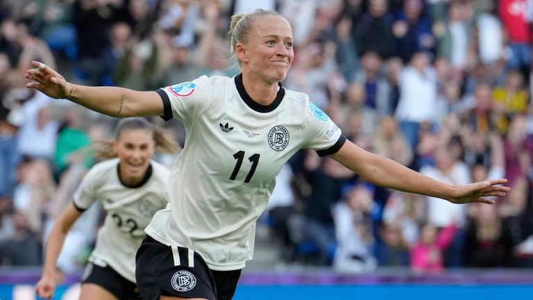 Germany's Lea Schueller celebrates after scoring her side's second goal during the Euro 2025, group C, soccer match between Germany and Denmark at St. Jakob-Park in Basel, Switzerland, Tuesday, July 8, 2025. (AP Photo/Martin Meissner)