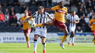 Marcus Fraser (left) and Tawanda Maswanhise compete for possession