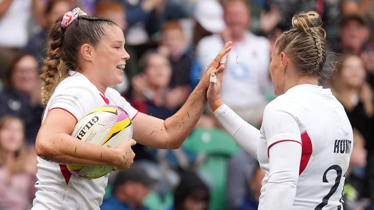 Jess Breach (left) scored a hat-trick in England's 14-try rout of Samoa