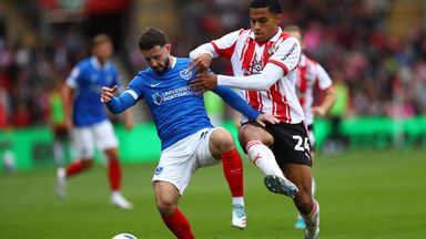 Conor Chaplin of Portsmouth battles for possession with Shea Charles of Southampton