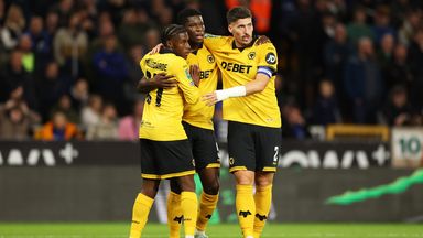 Marshall Munetsi of Wolves celebrates scoring with team-mates Jean-Ricner Bellegarde and Matt Doherty against Everton in the Carabao Cup