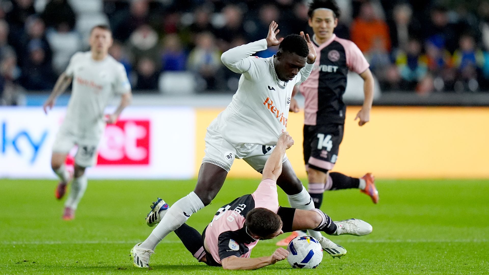 QPR edge win at 10-player Swansea after headbutt red card