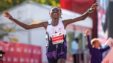 Ruth Chepngetich crosses the finish line of the Chicago Marathon to break the world record in October 2024