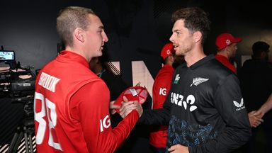 Captains Harry Brook and Mitchell Santner shake hands after England and New Zealand's T20I was washed out in Auckland