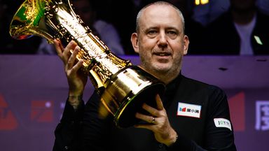 Mark Williams holds the Xi'an Grand Prix trophy aloft