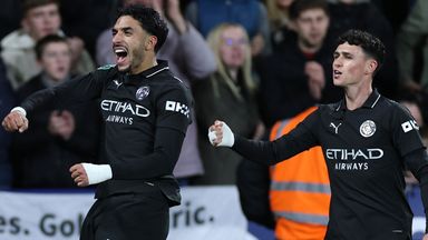 Omar Marmoush (left) celebrates with Phil Foden after putting Man City 2-1 ahead at Swansea