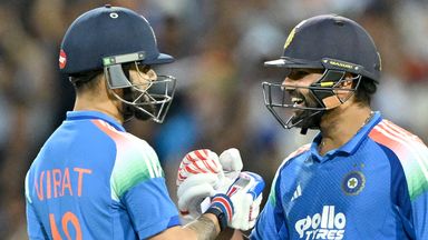 Rohit Sharma (right) and Virat Kohli celebrate India's win over Australia in the third ODI at Sydney