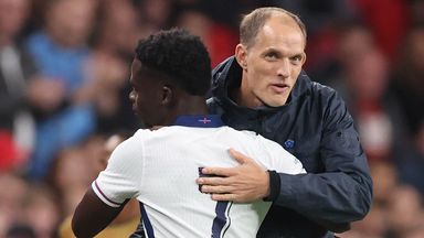England boss Thomas Tuchel embraces Bukayo Saka after subbing him off against Wales