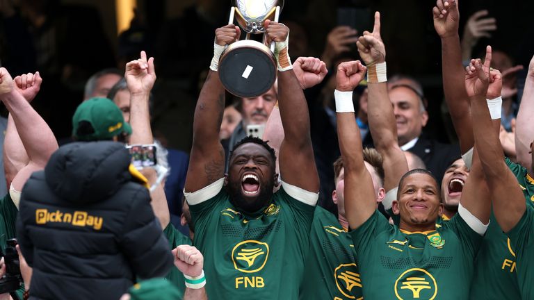 Siya Kolisi lifts the Rugby Championship trophy at Twickenham after South Africa's 29-27 victory over Argentina