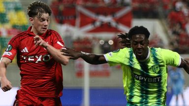 AEK's Jeremie Gnali (right) and Aberdeen's Dylan Lobban fight for the ball