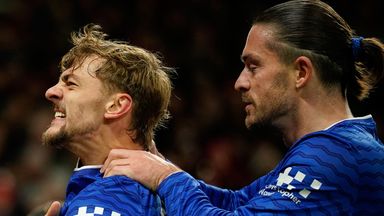 Everton's Kiernan Dewsbury-Hall, left, celebrates with Jack Grealish after scoring the opening goal during the English Premier League soccer match between Manchester United and Everton in Manchester, England, Monday, Nov. 24, 2025. (AP Photo/Dave Tho