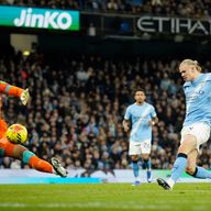 Manchester City's Erling Haaland shoots and scores his sides third goal of the game (AP Photo/Dave Thompson)