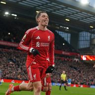 Liverpool's Florian Wirtz celebrates with teammates after scoring his side's second goal against Wolves