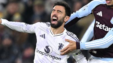 Bruno Fernandes is challenged by Boubacar Kamara in the first half