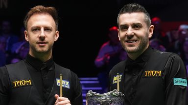 Finalists Judd Trump and Mark Selby pose for a photo ahead of the final