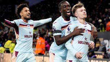 Brentford's Keane Lewis-Potter celebrates scoring the opening goal with Kevin Schade and Michael Kayode