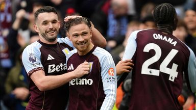 Aston Villa's Matty Cash (centre) celebrates with John McGinn after scoring their side's first goal of the game