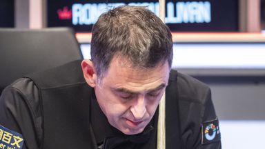 Ronnie O'Sullivan fell to a 6-4 defeat to Zhou Yuelong in the first round of the UK Championship