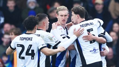 Birmingham City players celebrate Oxford United 's Myles Peart-Harris scoring an own goal 
