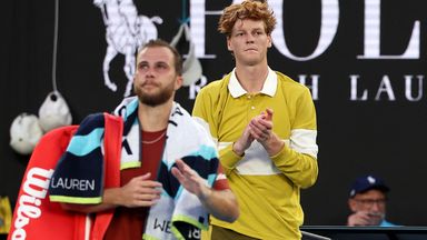Jannik Sinner applauds after his opponent Hugo Gaston  retired after two sets