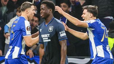 Rangers' Djeidi Gassama looks dejected as Porto's Jan Bednarek and Francisco Moura celebrate Emmanuel Fernandez's own goal 