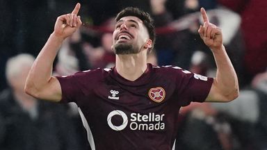 Claudio Braga celebrates after scoring a late equaliser for Hearts against Celtic