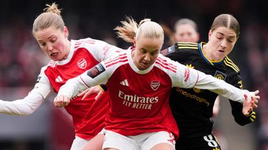 Kim Little and Beth Mead battle with Manchester United's Jess Park