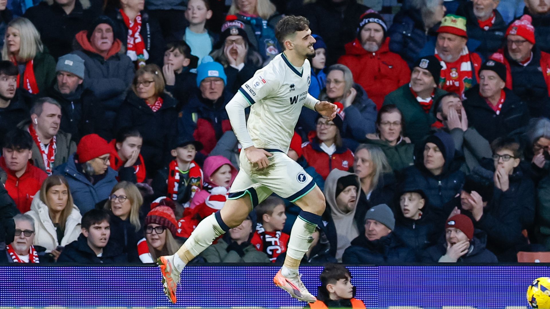 Millwall win at Wrexham to bolster play-off hopes