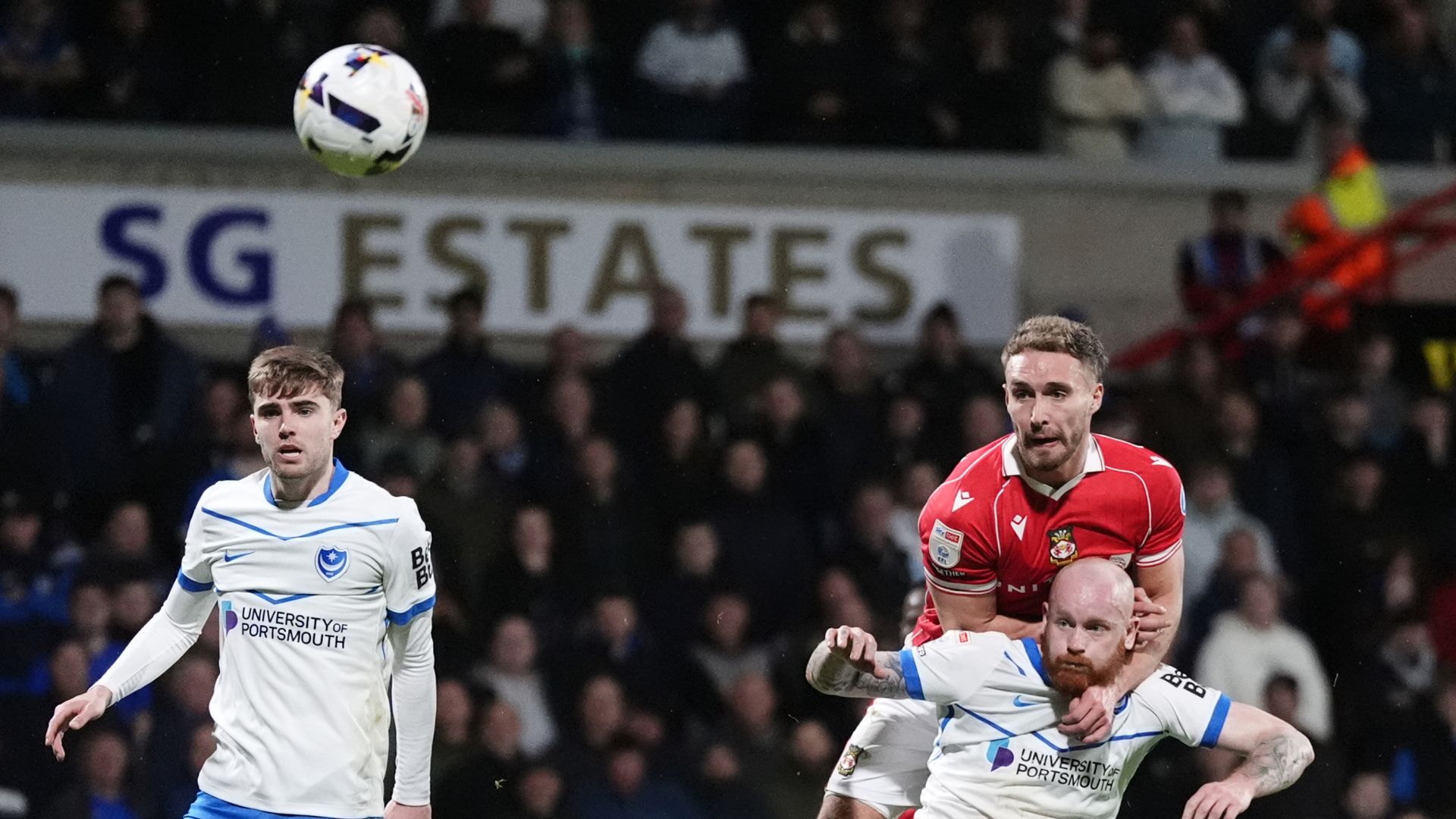 Wrexham see off Pompey to tighten play-off grip