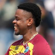 West Indies' Shimron Hetmyer (right) congratulates captain Shai Hope on his unbeaten 61 in their T20 World Cup victory over Nepal