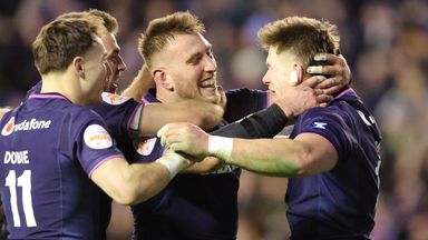 Scotland's Huw Jones (right) celebrates with team-mates after scoring a try