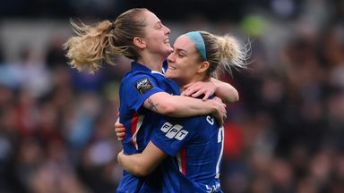Keira Walsh celebrates with team-mate Ellie Carpenter after giving Chelsea the lead at Spurs
