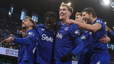 Everton players celebrate after taking the lead at Craven Cottage via a Bernd Leno own goal