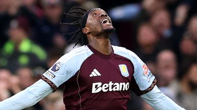 Tammy Abraham celebrates after scoring a late equaliser for Aston Villa against Leeds United