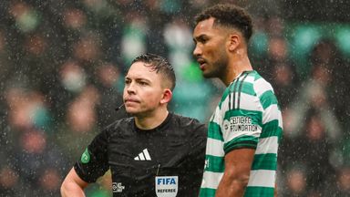GLASGOW, SCOTLAND - FEBRUARY 22: Celtic's Auston Trusty (R) and Referee Matthew MacDermid before Trusty is sent off following an altercation with Hibernian's Jamie McGrath during a William Hill Premiership match between Celtic and Hibernian at Celtic
