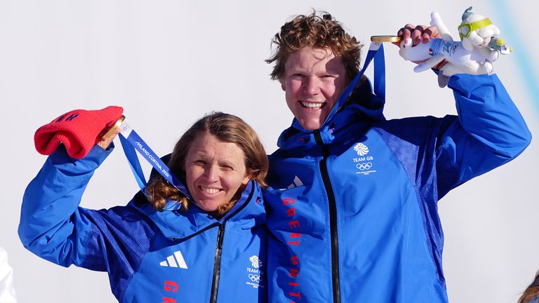 Bankes and Huw Nightingale with their gold medals from the mixed team snowboard cross final