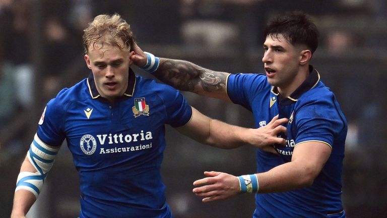 Menoncello (right) scored Italy's second as they flew out to 12-0