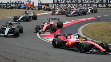 Ferrari driver Lewis Hamilton of Britain steers his car ahead of others during the Chinese Formula One Grand Prix race 