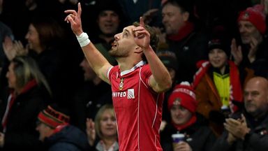 Sam Smith celebrates after giving Wrexham the lead against Chelsea
