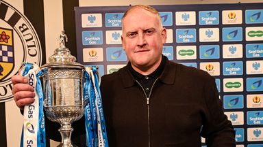Former Hibernian player Conrad Logan with the Scottish Cup trophy before the semi-final draw.