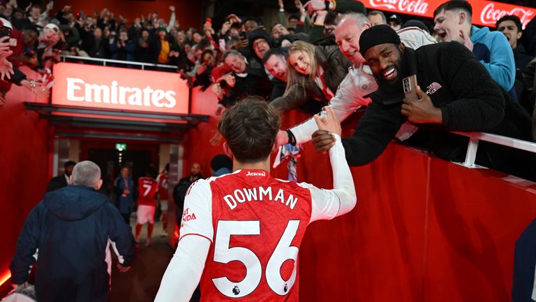 Max Dowman celebrates with fans after Arsenal's win over Everton