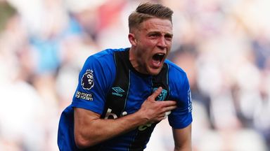 Adrien Truffert celebrates after restoring Bournemouth's lead at Newcastle