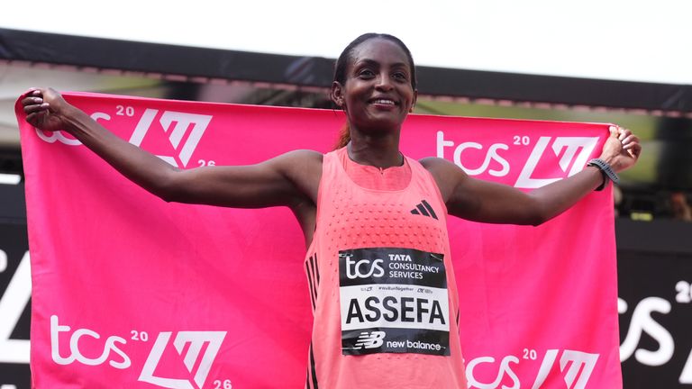 Tigst Assefa celebrates after winning the women's elite race at the 2026 London Marathon