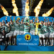 Celtic captain Callum McGregor lifts the Scottish Cup trophy