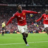 Kobbie Mainoo celebrates after restoring Manchester United's lead against Liverpool