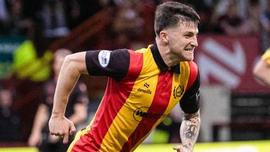Aidan Fitzpatrick scores to level the first leg of the Premiership play-off final between Partick Thistle and St Mirren