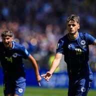Bosnia's Kerim Alajbegovic, right, celebrates after scoring his side's opening goal during the World Cup Group B soccer match against Qatar in Seattle, Wednesday, June 24, 2026. (AP Photo/Lindsey Wasson)