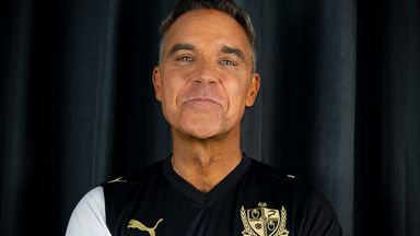 Robbie Williams will be have his logo on the front of Port Vale shirts after becoming Port Vale Foundation Ambassador
