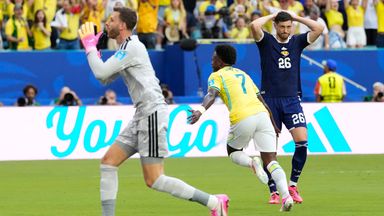 Vinicius Junior wheels away in celebration after giving Brazil an early lead 